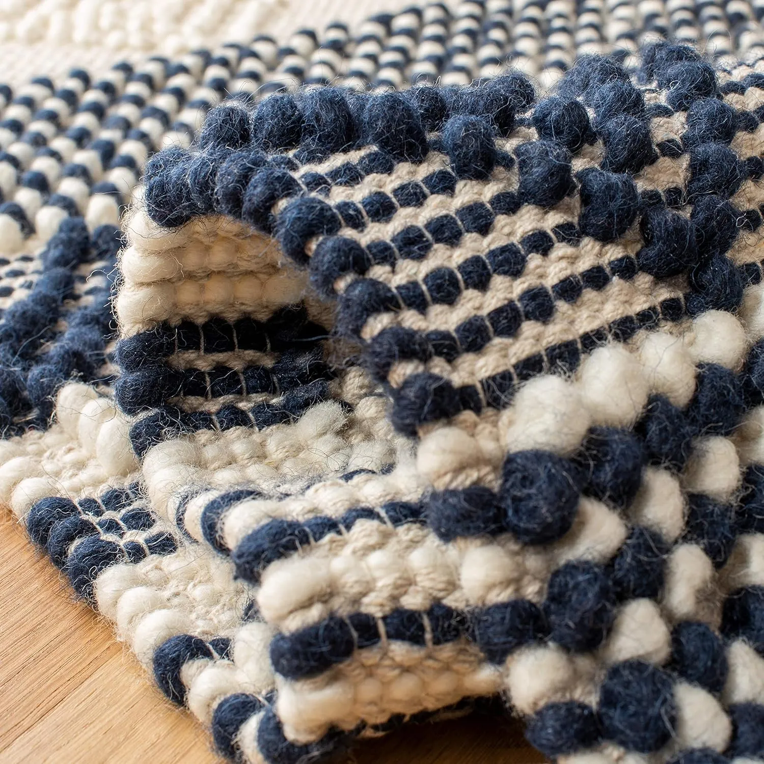 SAFAVIEH Natura Collection Accent Rug - 2' x 3', Navy & Ivory, Handmade Moroccan Boho Tribal Wool & Cotton, Ideal for High Traffic Areas in Entryway, Living Room, Bedroom (NAT102N)